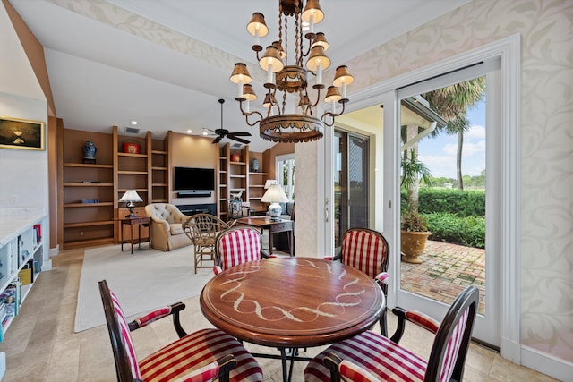 tiled dining room with ceiling fan with notable chandelier and crown molding