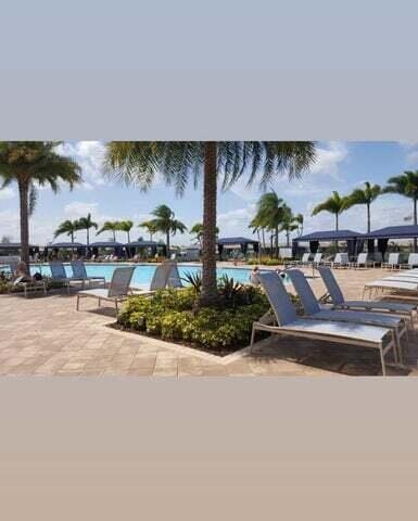 view of community with a pool and a patio