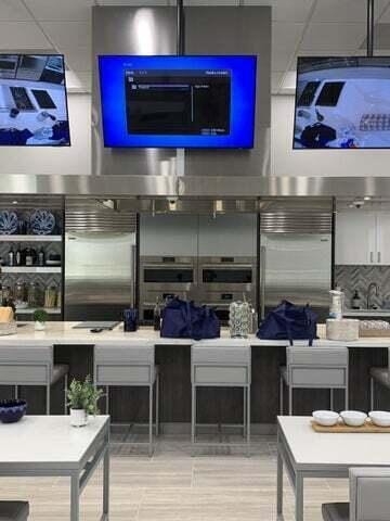 interior space with stainless steel built in refrigerator and tasteful backsplash