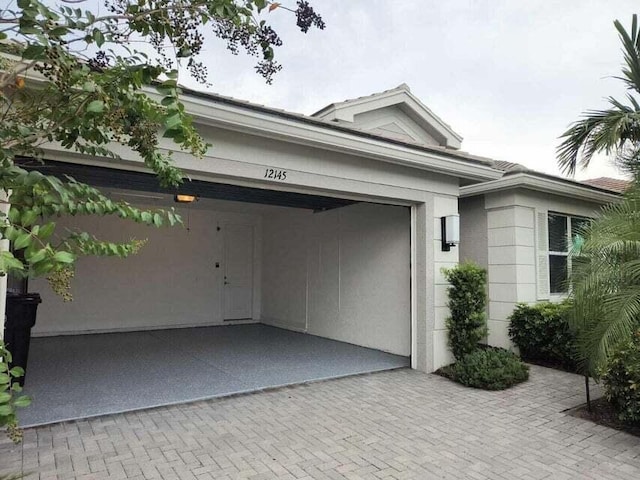 view of property exterior with a garage