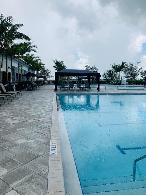 view of swimming pool with a gazebo