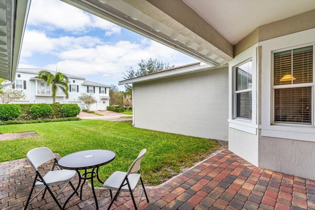 view of patio / terrace with a residential view