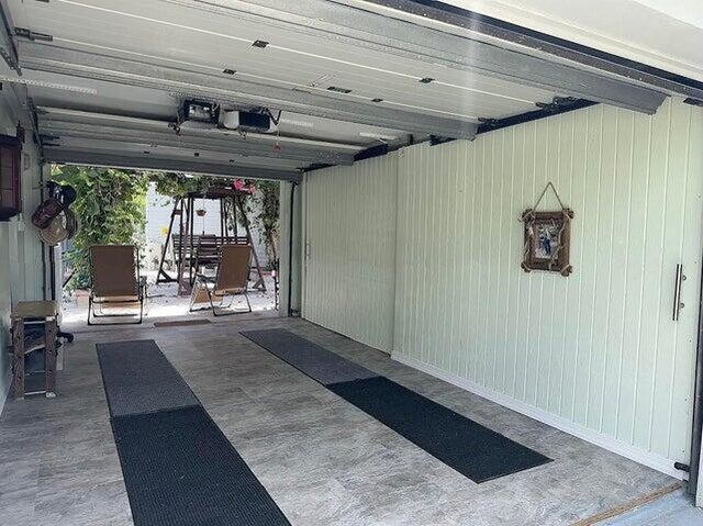 garage with wooden walls