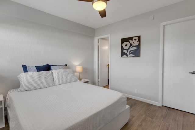 bedroom featuring ceiling fan and hardwood / wood-style floors