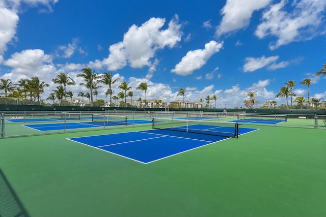 view of tennis court featuring basketball court