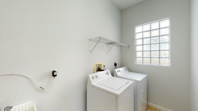 laundry room featuring washer and dryer