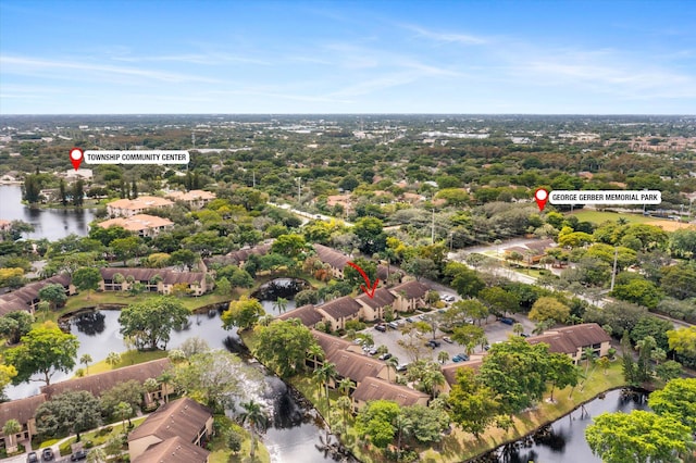 birds eye view of property featuring a water view