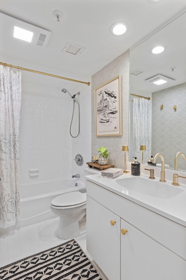 full bathroom with tile patterned flooring, vanity, toilet, and shower / tub combo