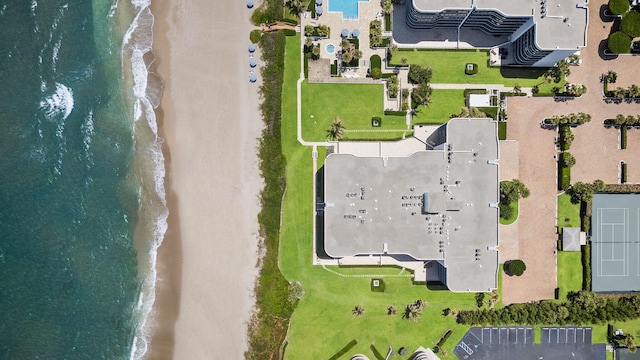 aerial view with a water view and a view of the beach