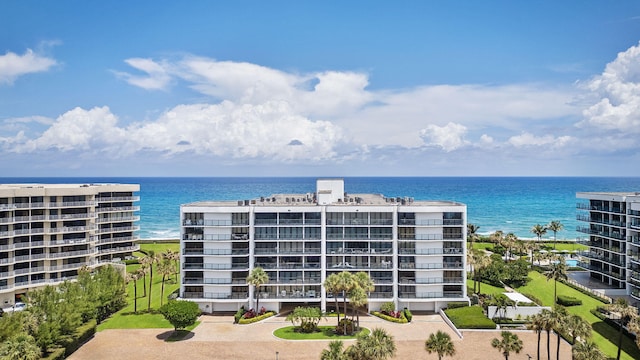 view of building exterior with a water view