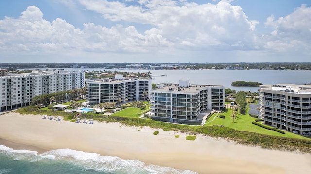 bird's eye view with a view of the beach and a water view