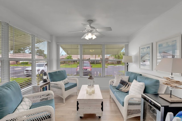 sunroom / solarium with ceiling fan