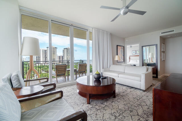 living room with ceiling fan