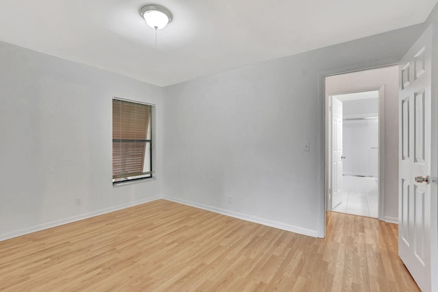 empty room featuring light hardwood / wood-style floors