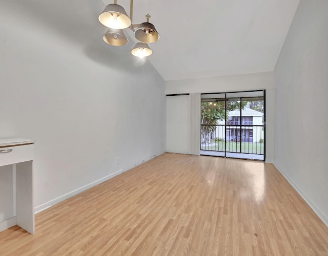 interior space with high vaulted ceiling and light hardwood / wood-style floors