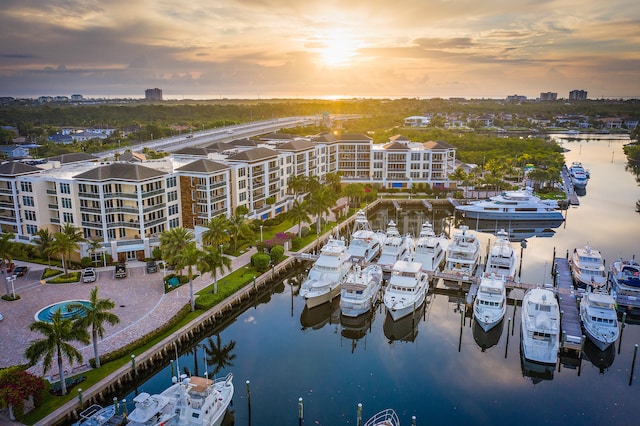 aerial view at dusk with a water view