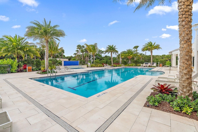 view of swimming pool featuring a patio