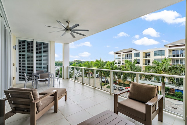 balcony featuring ceiling fan