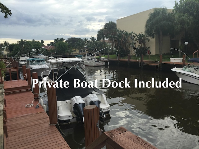 dock area featuring a water view