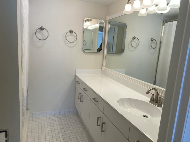 bathroom featuring tile patterned floors and vanity