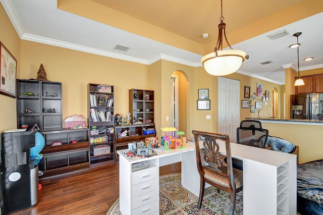 office with dark hardwood / wood-style floors, ornamental molding, and a tray ceiling