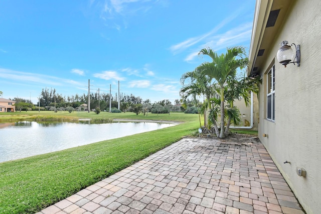 view of patio / terrace with a water view