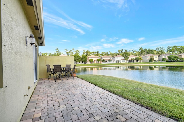 view of patio / terrace with a water view