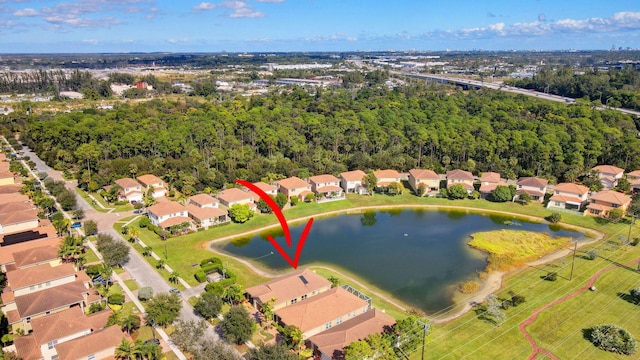 birds eye view of property featuring a water view