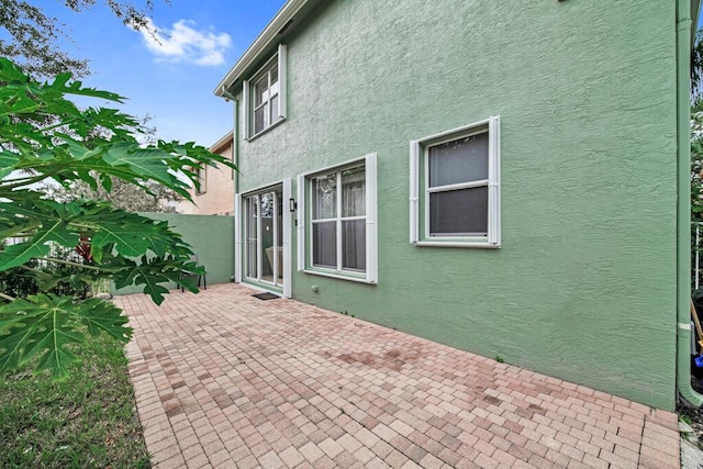 596 Calamint Pt, Royal Palm Beach, FL 33411 - exterior space with a patio
