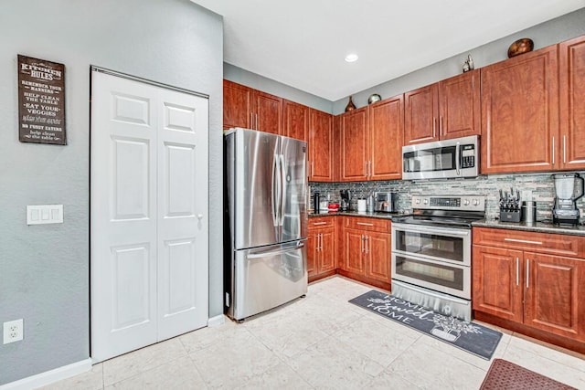 kitchen featuring decorative backsplash, light tile patterned flooring, and appliances with stainless steel finishes