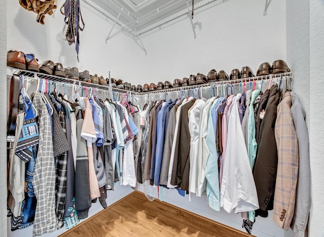 spacious closet featuring hardwood / wood-style floors