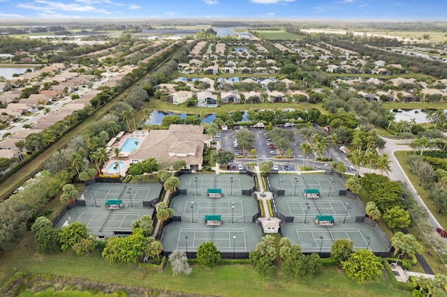 birds eye view of property featuring a water view