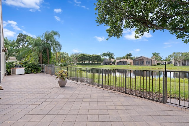 view of patio / terrace featuring a water view