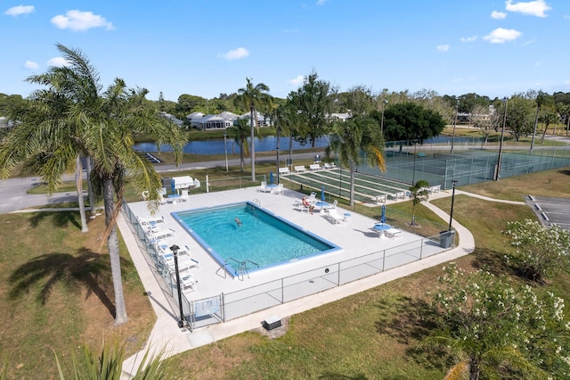 view of pool featuring a water view