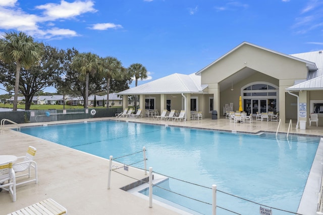 view of swimming pool featuring a patio area