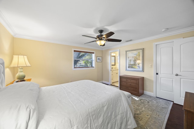 bedroom featuring ensuite bath, ceiling fan, dark hardwood / wood-style flooring, and ornamental molding