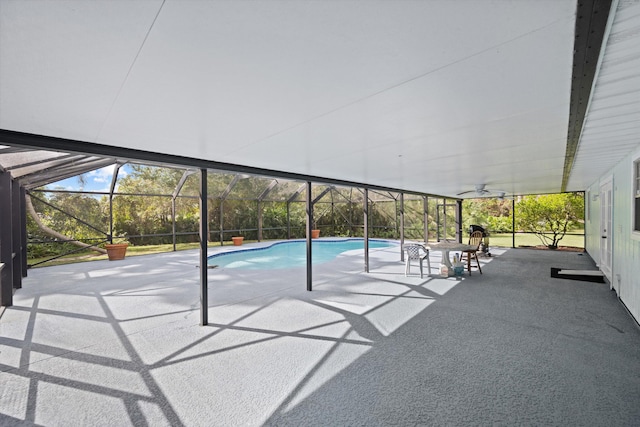 view of swimming pool featuring a patio area and ceiling fan