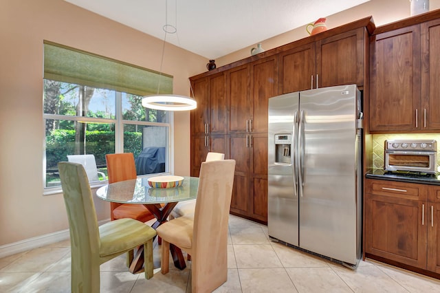 dining space with light tile patterned flooring