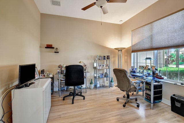 office featuring light hardwood / wood-style flooring and ceiling fan