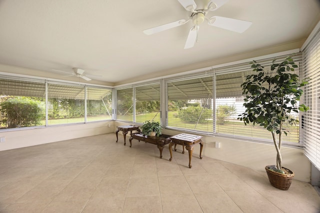 sunroom / solarium with ceiling fan