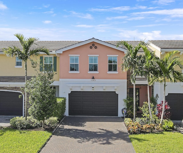 view of front of home with a garage