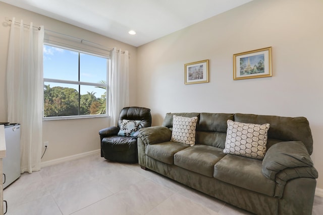 living room with light tile patterned flooring