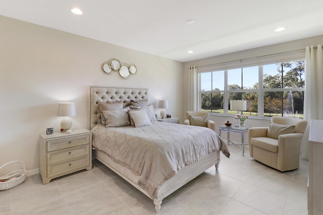 bedroom featuring light tile patterned flooring