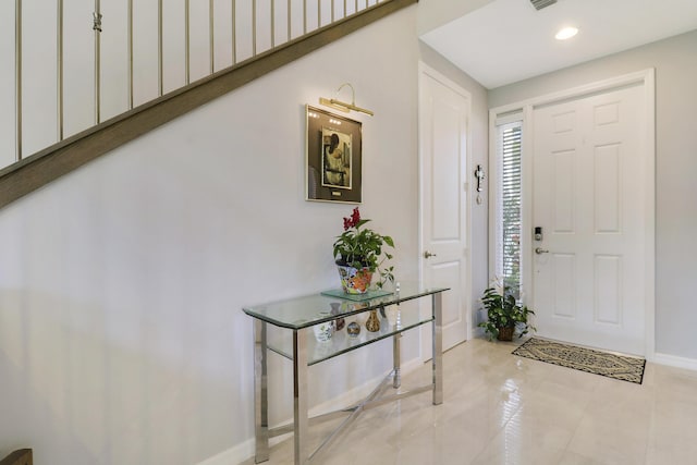 view of tiled foyer entrance