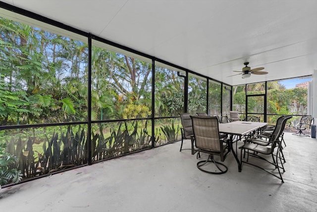 sunroom / solarium with ceiling fan