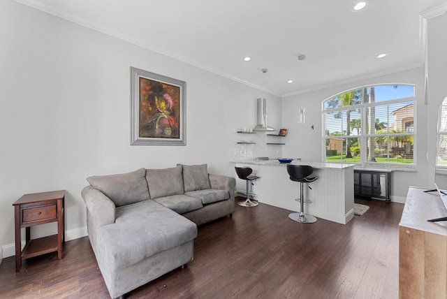 living room with crown molding and dark hardwood / wood-style flooring