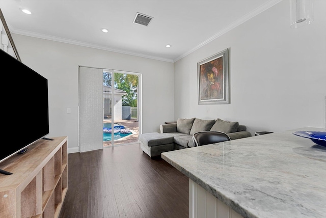 living room featuring dark hardwood / wood-style flooring and ornamental molding