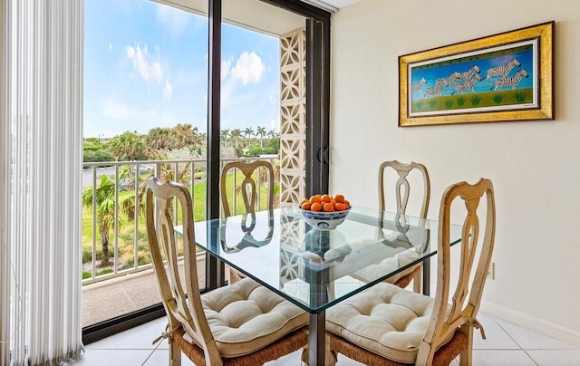 dining space with light tile patterned floors