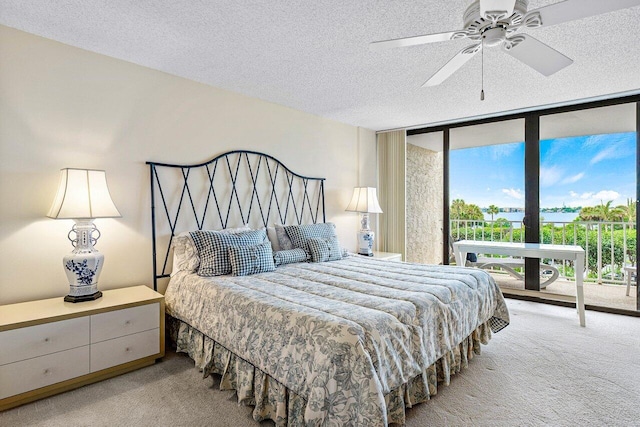 3400 S Ocean Blvd Unit 2Aii, Palm Beach, FL 33480 - carpeted bedroom with floor to ceiling windows, a textured ceiling, access to outside, and ceiling fan