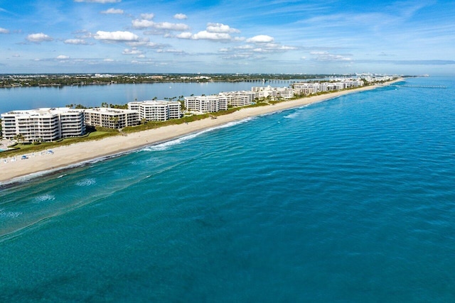 aerial view with a view of the beach and a water view